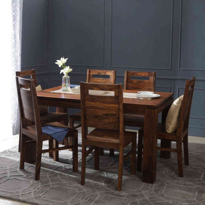 Gautam Dining Set, which is made from sheesham wood, is an excellent choice for interior design and home decor. suitable for dining room or kitchen furniture