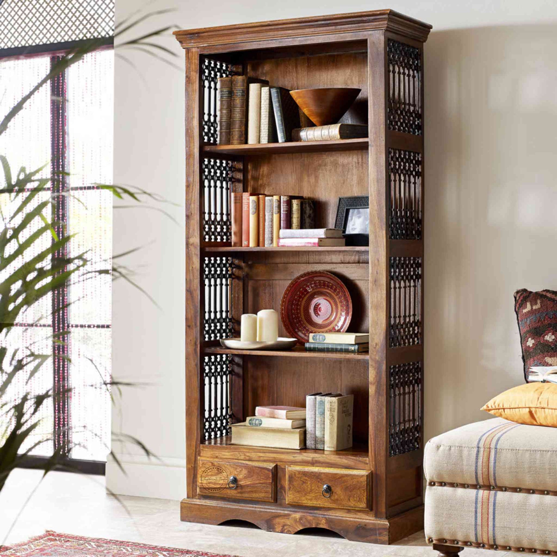 Handcrafted Sheesham wood bookshelf with iron jali, honey finish, four shelves and two drawers. Perfect for home and office wooden furniture.